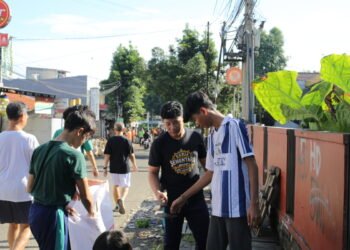 PC  LDII Tanah Sareal Gelar Kerja Bakti Rutin di Jalan Perdana Raya